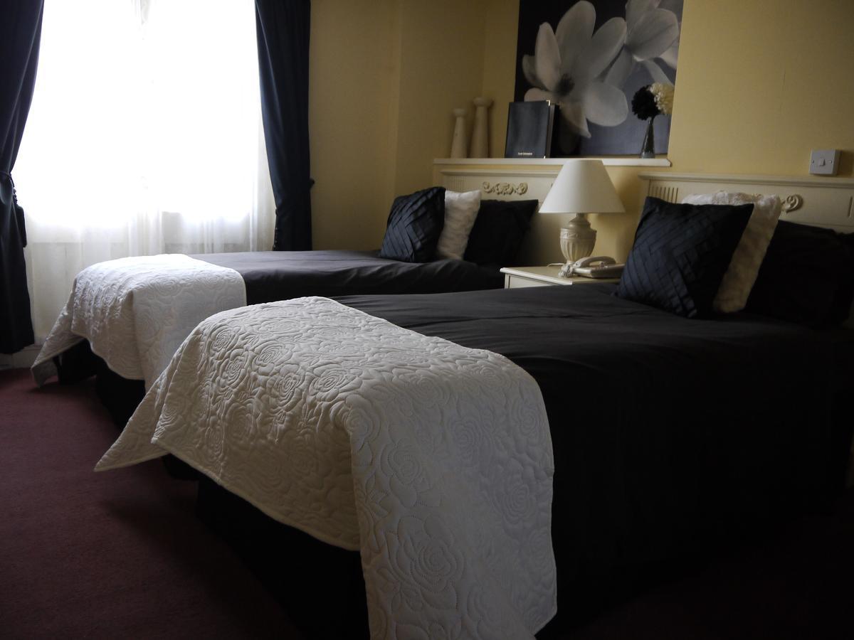 The Bell Hotel Winslow Bagian luar foto